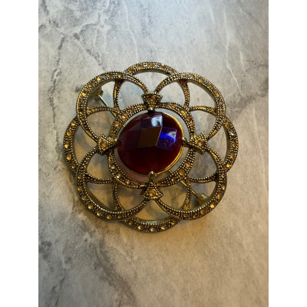 Vintage Monet Gold Tone Red Stone Rhinestone Floral Openwork Brooch Pin